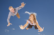 Photo: two people sky diving two people sky diving