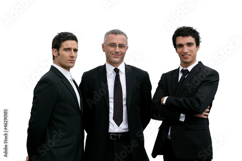 Photo: Three confident businessmen on white background Three confident businessmen on white background