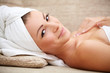Photo: beautiful woman lying on a massage table beautiful woman lying on a massage table