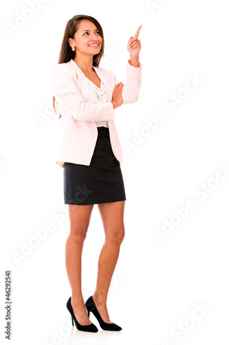 Photo: Business woman pointing up Business woman pointing up