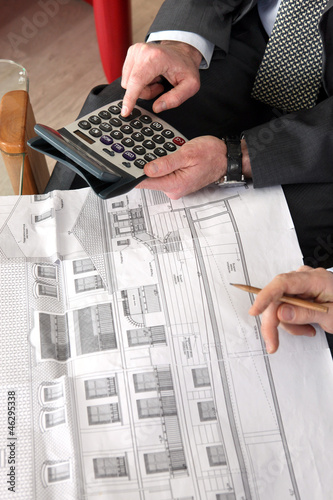 Photo: Architects making calculations Architects making calculations