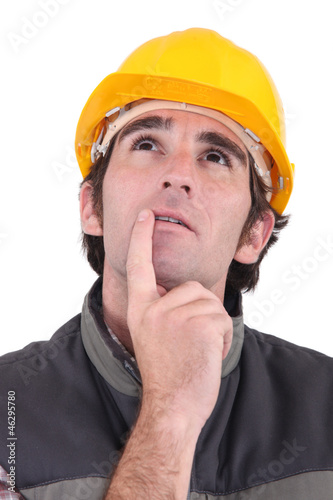 Photo: Tradesman deep in thought Tradesman deep in thought