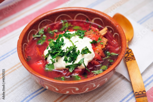 Photo: Beetroot soup with meat in ceramic bowl Beetroot soup with meat in ceramic bowl