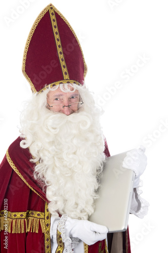 Photo: Sinterklaas using a laptop Sinterklaas using a laptop