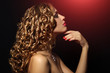 Portrait of a beautiful girl with curly hair