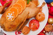 Foto: Roast duck on a plate. Roast duck on a plate.