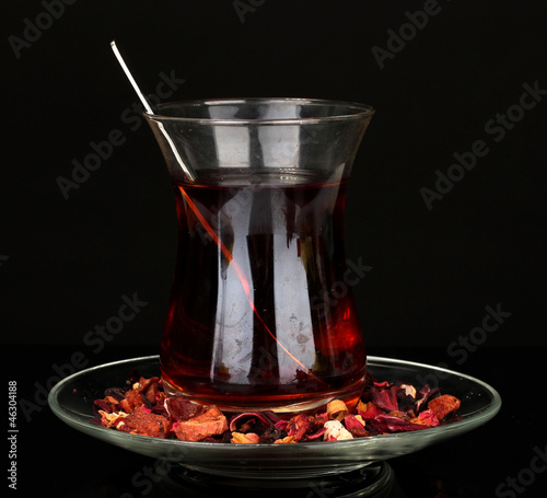 Photo: glass of Turkish tea isolated on black glass of Turkish tea isolated on black