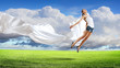 Modern style dancer against blue sky