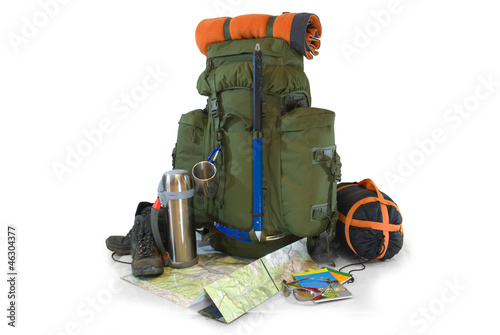 Photo: Backpack with tourist equipment - isolated on white Backpack with tourist equipment - isolated on white