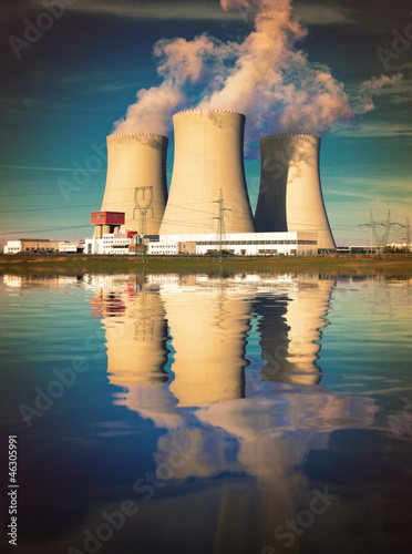 Photo: Nuclear power plant on the coast. Ecology disaster concept. Nuclear power plant on the coast. Ecology disaster concept.