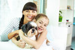 Foto: Mother, daughter and pet Mother, daughter and pet