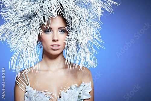 Photo: Winter woman in a dress of Snow Queen Winter woman in a dress of Snow Queen