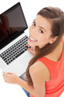 Photo: Young woman with laptop Young woman with laptop