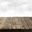 rustic wood plank with snowflakes at the background