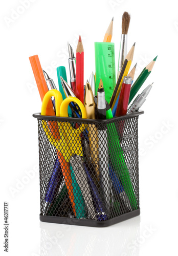 Photo: holder basket and office supplies isolated on white holder basket and office supplies isolated on white