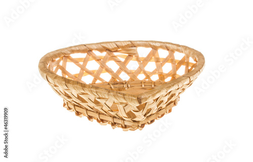 Photo: Wickerwork empty yellow breadbasket on white background Wickerwork empty yellow breadbasket on white background