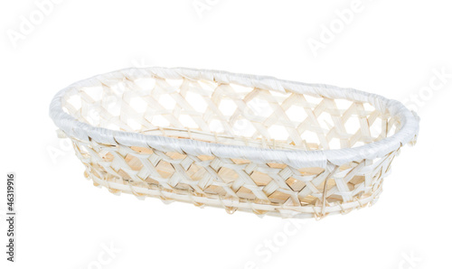 Photo: Wickerwork empty yellow breadbasket on white background Wickerwork empty yellow breadbasket on white background