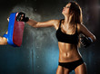 Photo: Young woman hitting Young woman hitting