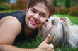Photo: Young man and shih tzu Young man and shih tzu