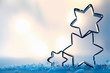 Star cookie cutters on snow crystals