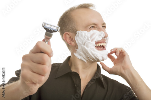 Photo: man demonstrating shaving razor man demonstrating shaving razor