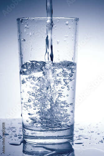 Photo: Water poured into glass Water poured into glass