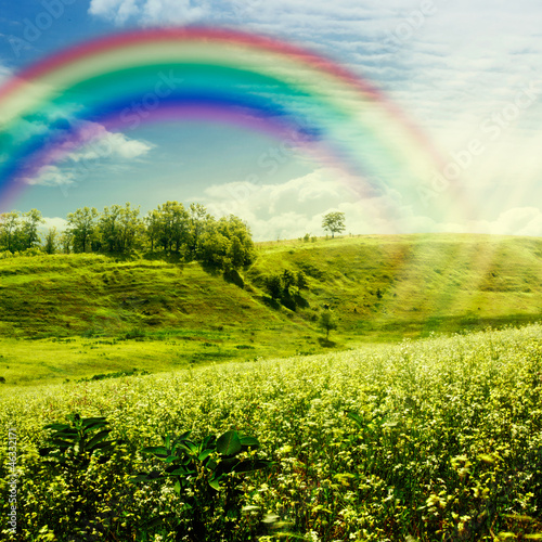 Photo: Rainbow on the meadow. Abstract natural backgrounds for your des Rainbow on the meadow. Abstract natural backgrounds for your des