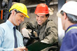 Photo: Workers And Supervisors At Warehouse Workers And Supervisors At Warehouse