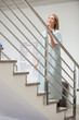 Female patient walking up stairs
