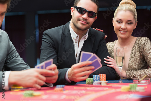 Photo: Couple at the poker table Couple at the poker table