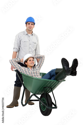 Photo: Builders and wheelbarrow Builders and wheelbarrow