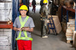 Mid Adult Foreman With Digital Tablet At Warehouse