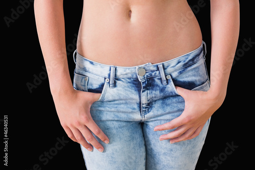 Photo: Woman wearing jeans Woman wearing jeans