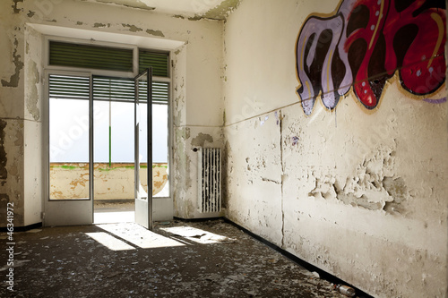 Photo: abandoned building, empty room with window abandoned building, empty room with window