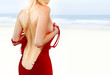 back of woman on shore l