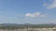 Time lapse view over the city of Arta with clouds passing by