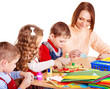 Kindergarden teacher with group children.