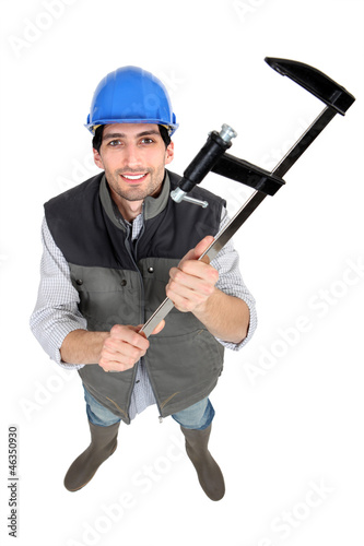 Photo: Builder holding clamp Builder holding clamp