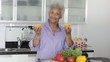 Senior African American woman with orange