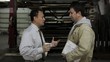 Factory supervisor talking to the foreman
