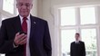 Caucasian businessman text messaging on cell phone