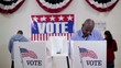 Video: Rows of voters coming and going at voting booths at polling place Rows of voters coming and going at voting booths at polling place