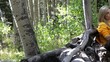 Hispanic woman taking a break from a hike to write