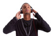 Young black man with closed eyes listening to music