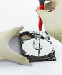 technician with open hard-disk