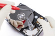 technician with open hard-disk