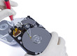 technician with open hard-disk