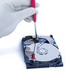 technician with open hard-disk