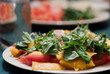 canvas print picture - Green salad with mango and tomatoes