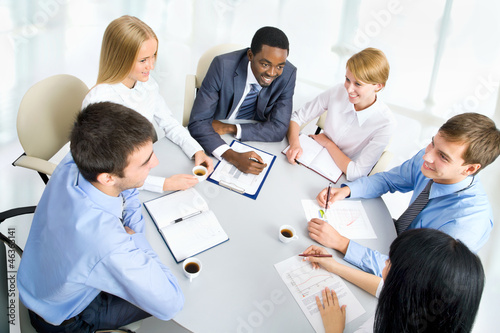 Photo: Business people working together. Business people working together.